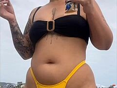 wanna see this yellow bikini splitting my swollen black pussy on the beach?