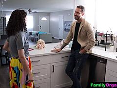 stepdaughter drops to her knees and deepthroats stepdad's cock hungrily