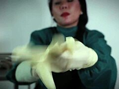 Nurse strokes patient with tight latex gloves fetish.