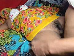 Desi village wife in yellow saree spreads hairy pussy for hard quickie fuck