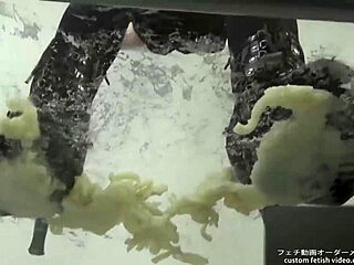 Asian Fetish Babe Stomps Noodles In Sexy Boots