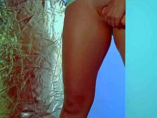 College Desi in sexy dress plays with glass dildo